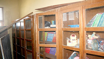 Damaged shelves of St. Vincentius’ library after the tidal wave hit