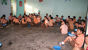Daily “plain porridge” breakfast in St. Vincentius Primary School, Sikakap